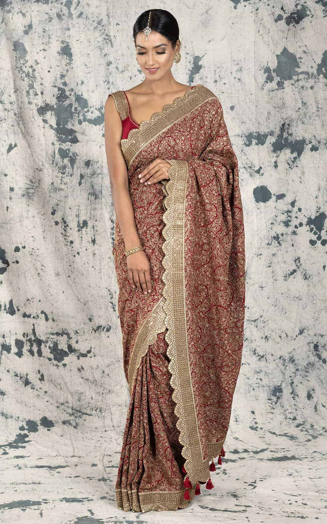 Maroon sequence work Georgette saree.