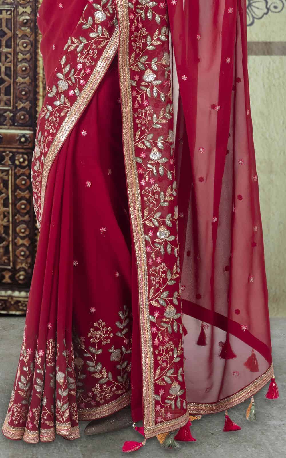 Maroon Georgette Saree with sequins work.