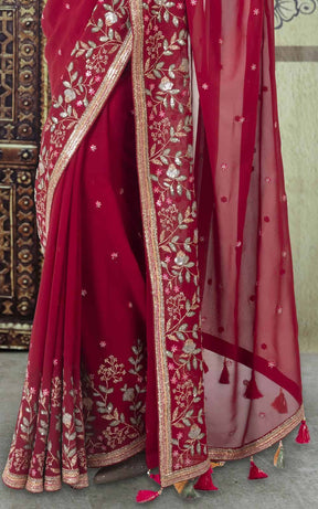Maroon Georgette Saree with sequins work.