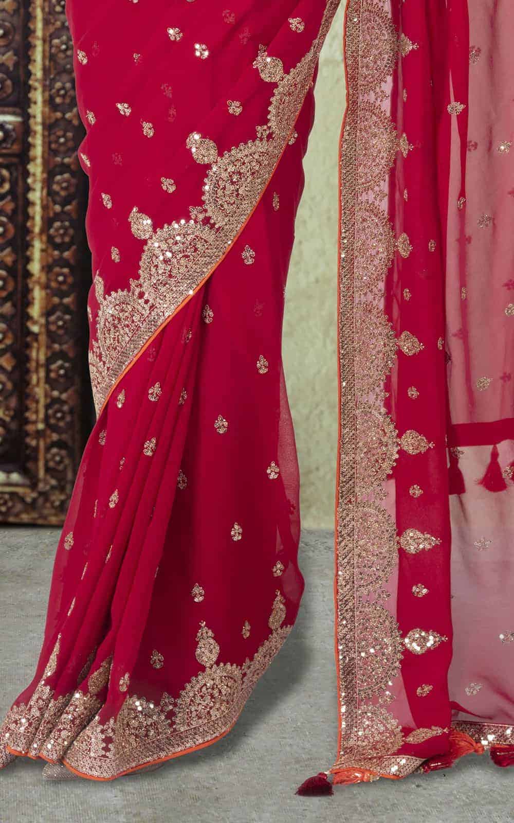 Crimson Red Georgette Saree with sequins and zari work.