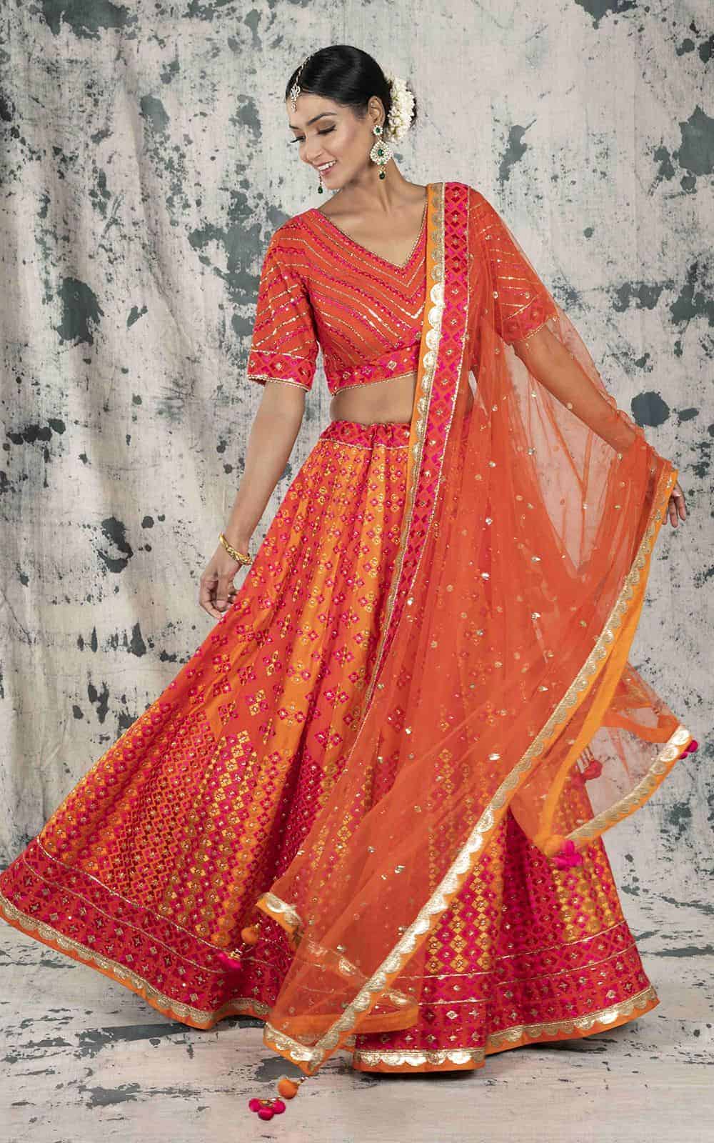 Orange Color Silk Lehenga.